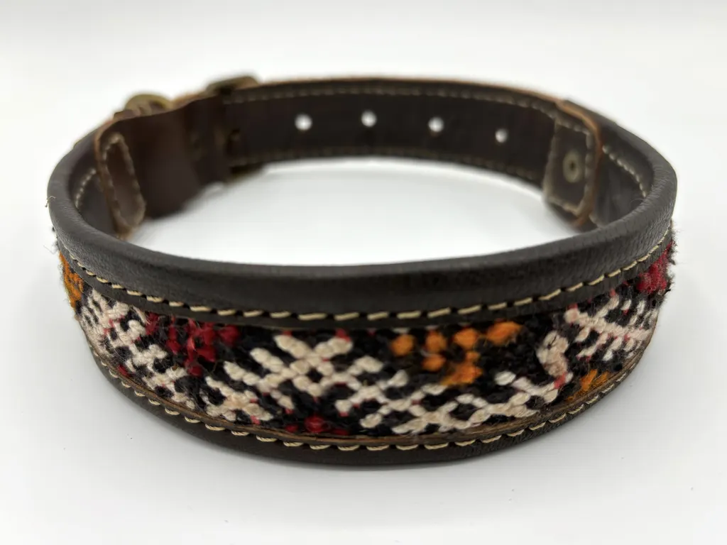 Close view of the Desert Dunes kilim weave in cream, rust and orange